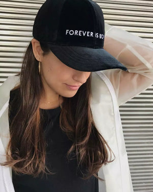 Cap Black Velvet with FOREVER IS BORING embroidery on the front.