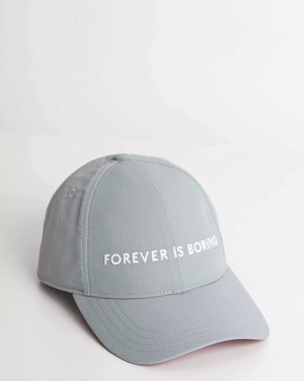 Cap FIB Grey Grid with FOREVER IS BORING embroidery in white on the front.