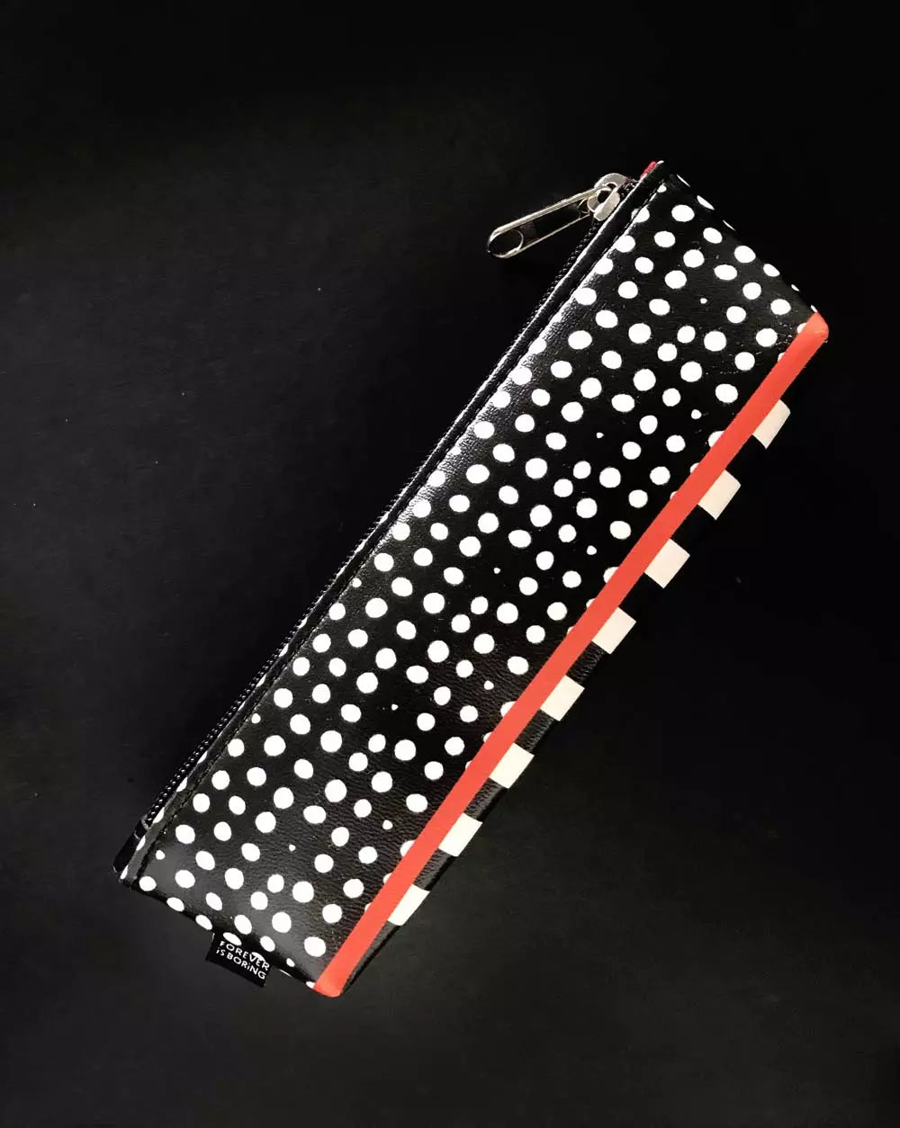 Pencil Case DOTS with black and white design with wild red lining.