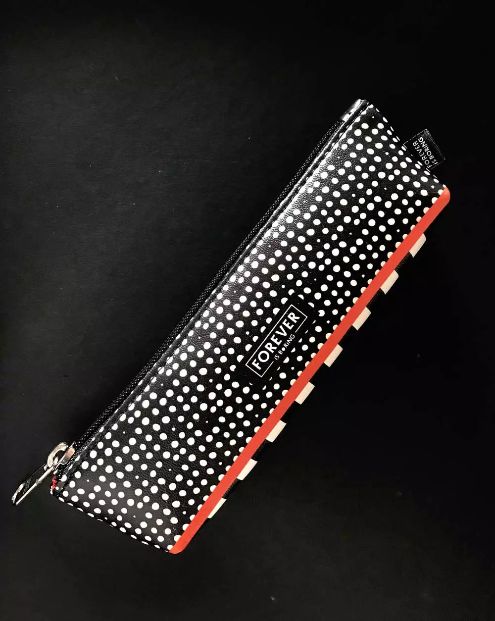Pencil Case DOTS with black and white design with wild red lining and FIB logo.
