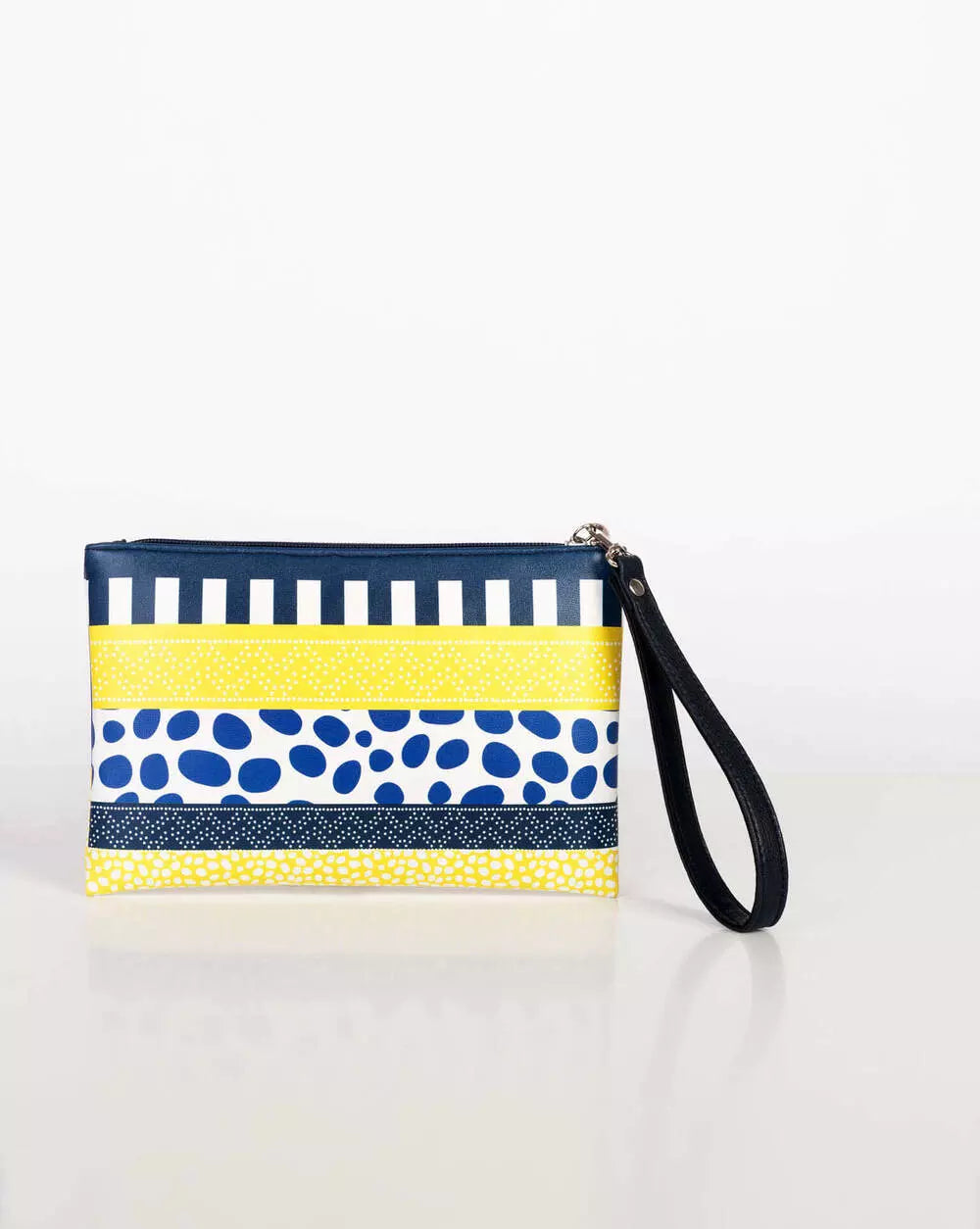 Forever is Boring Hop Pebbles YL Clutch back with four stripes, one in dark blue with horizontal white rectangles, one in yellow with small white dots, one in white with big blue spots, one in blue with white spots in zigzag and one yellow with big white dots.
