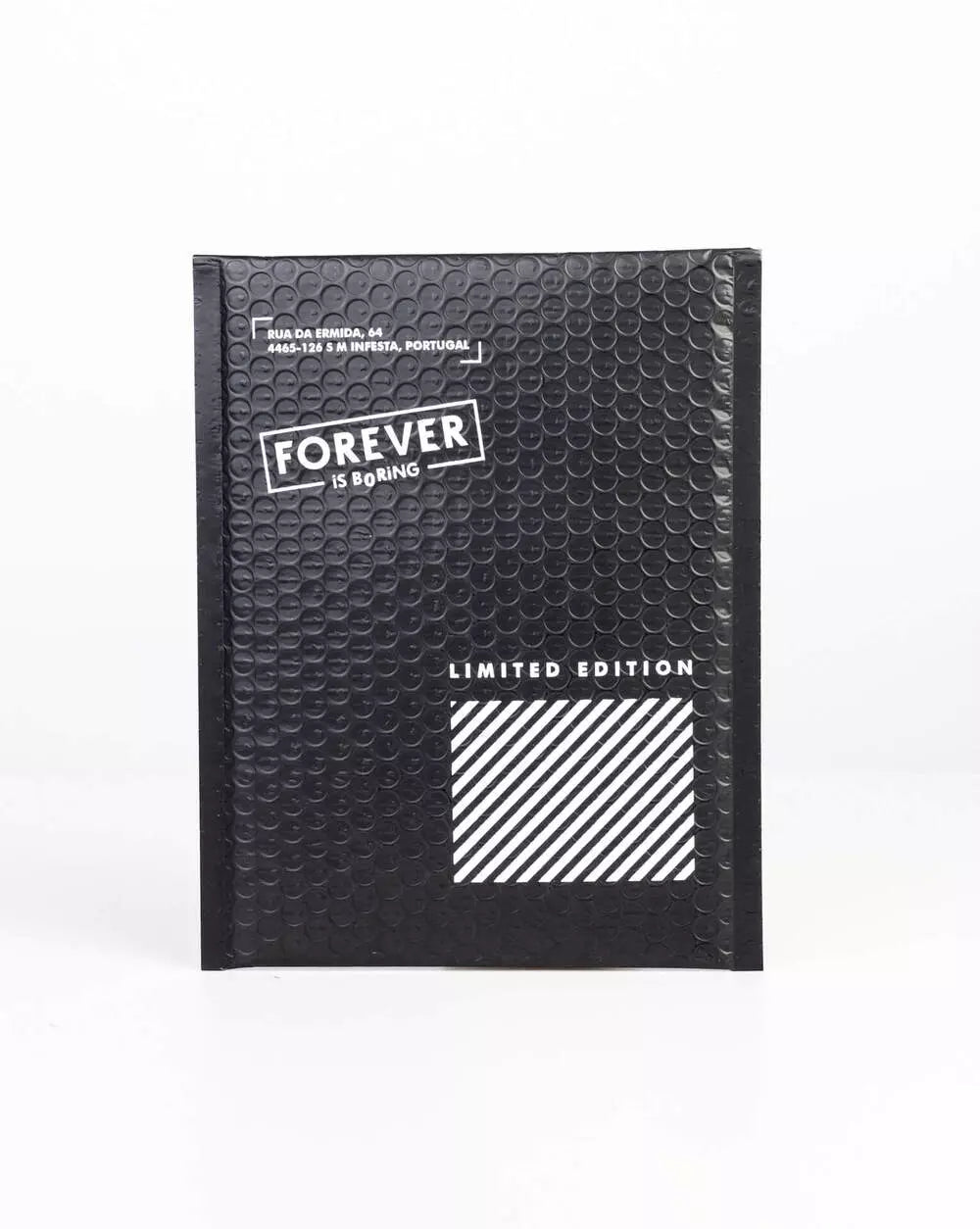 Forever Is Boring gift bag size s. Black with inscriptions in white. 